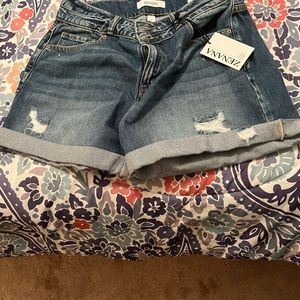 Slightly distressed denim shorts